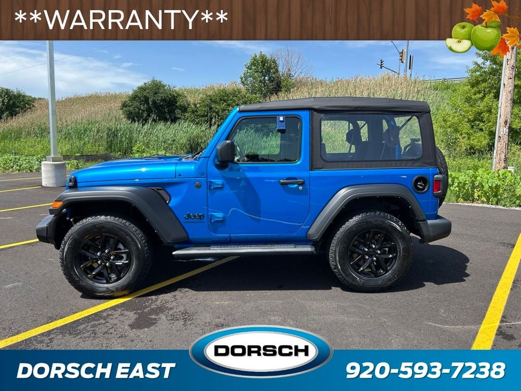 2023 Jeep Wrangler — rear three-quarter view