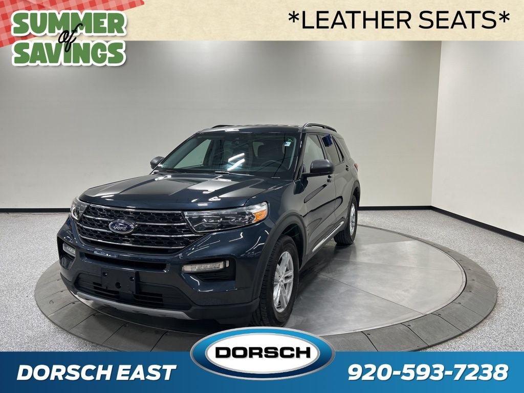 2024 Ford Explorer XLT in Stone Blue Metallic — front three-quarter view