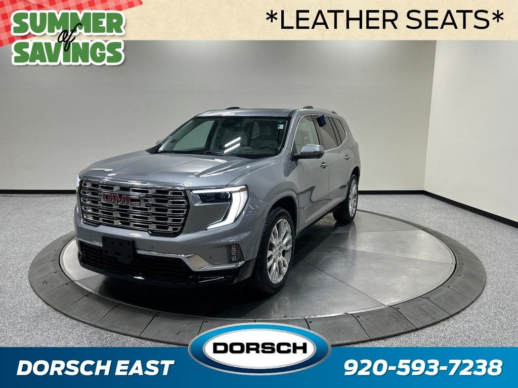 2024 GMC Acadia Denali in Sterling Metallic — front three-quarter view