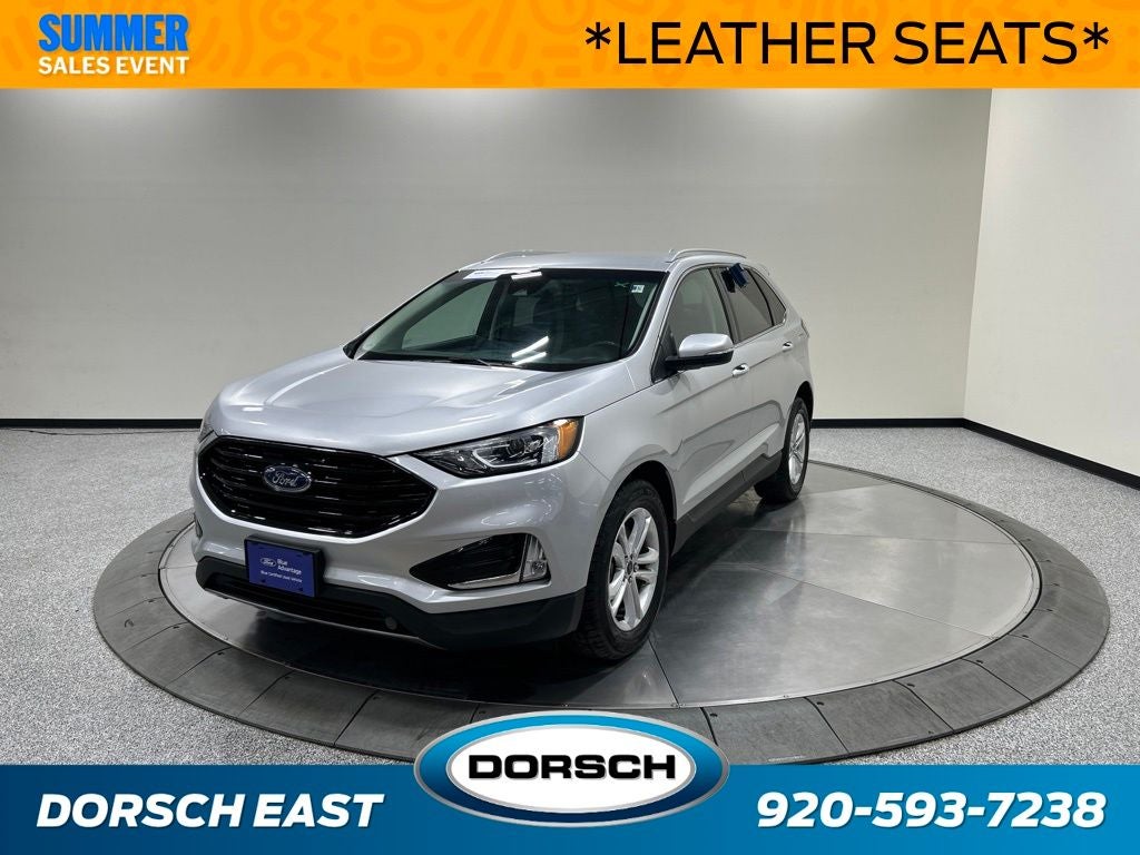 2019 Ford Edge SEL in Ingot Silver Metallic — front three-quarter view