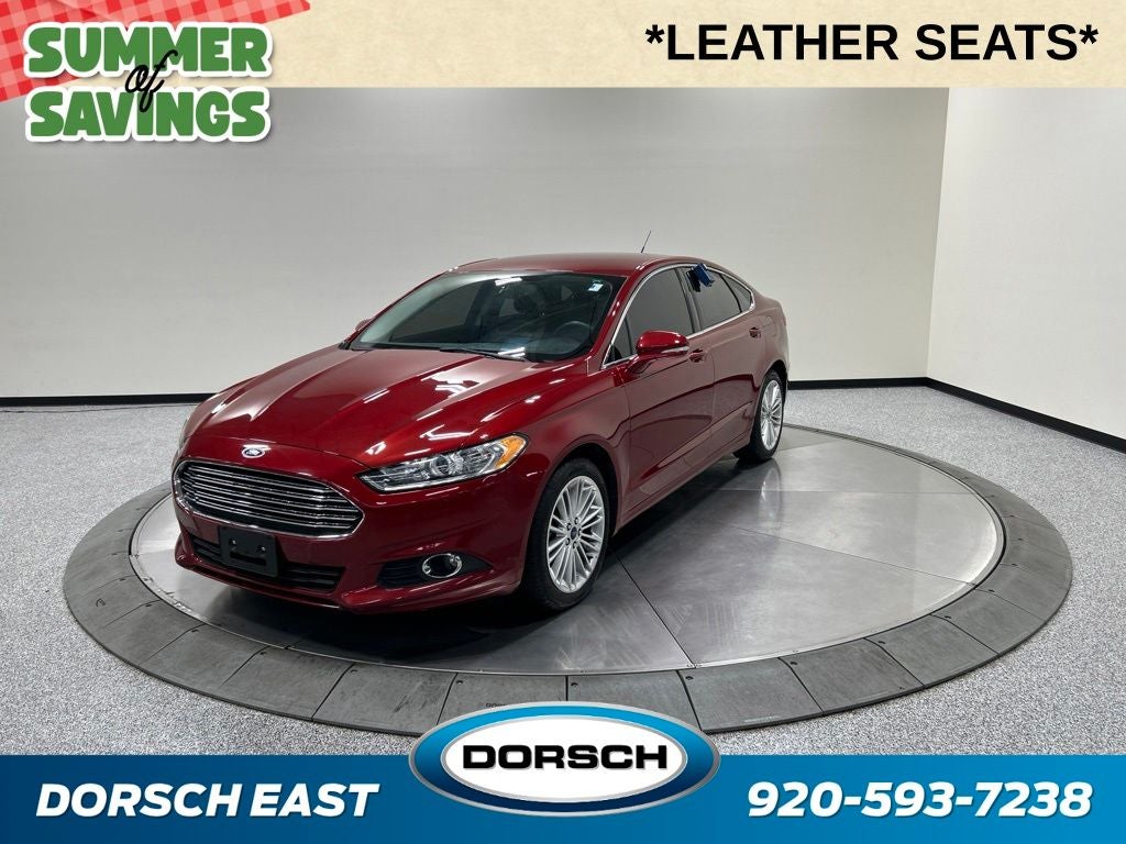 2016 Ford Fusion SE in Ruby Red Metallic — front three-quarter view