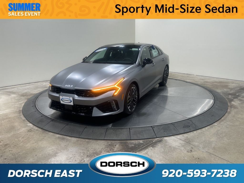 2026 Kia K5 GT in Steel Matte Gray — front three-quarter view